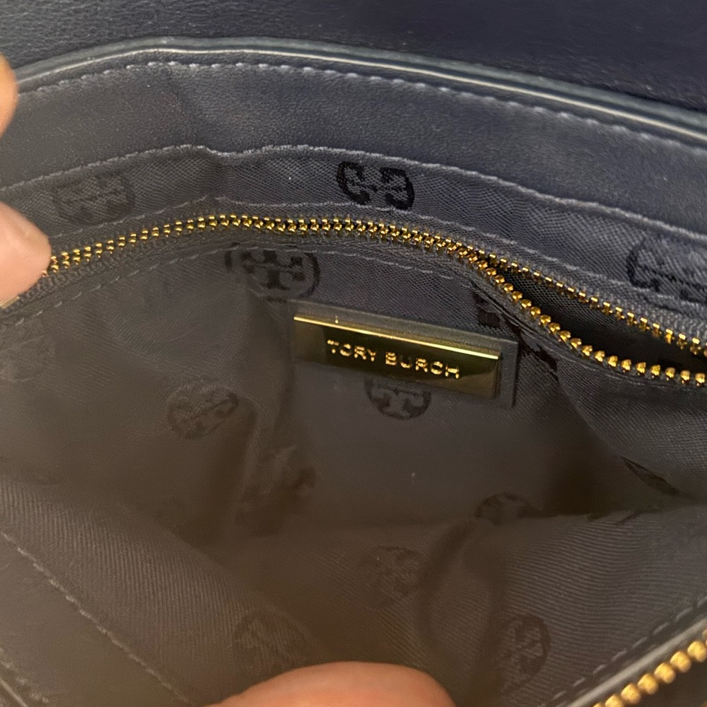 “Tory Burch Fleming Suede Fringe Crossbody Bag – Navy Blue”

• - Picture 4 of 10